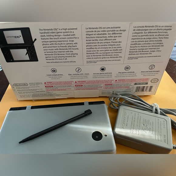 Nintendo DSi, black (includes  protective skin, stylus pen, charger, and R4i). - Picture 9 of 10